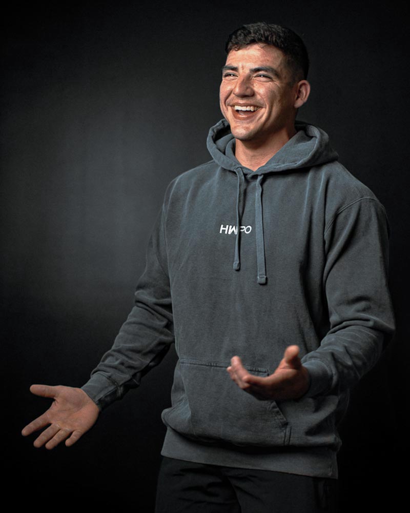 Josh Godinez in the  wearing the HWPO Hoodie