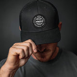 Harry Palley showing the HWPO Global Trucker Hat