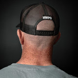 Rear view of Matt O'Keefe wearing the HWPO Trucker Hat