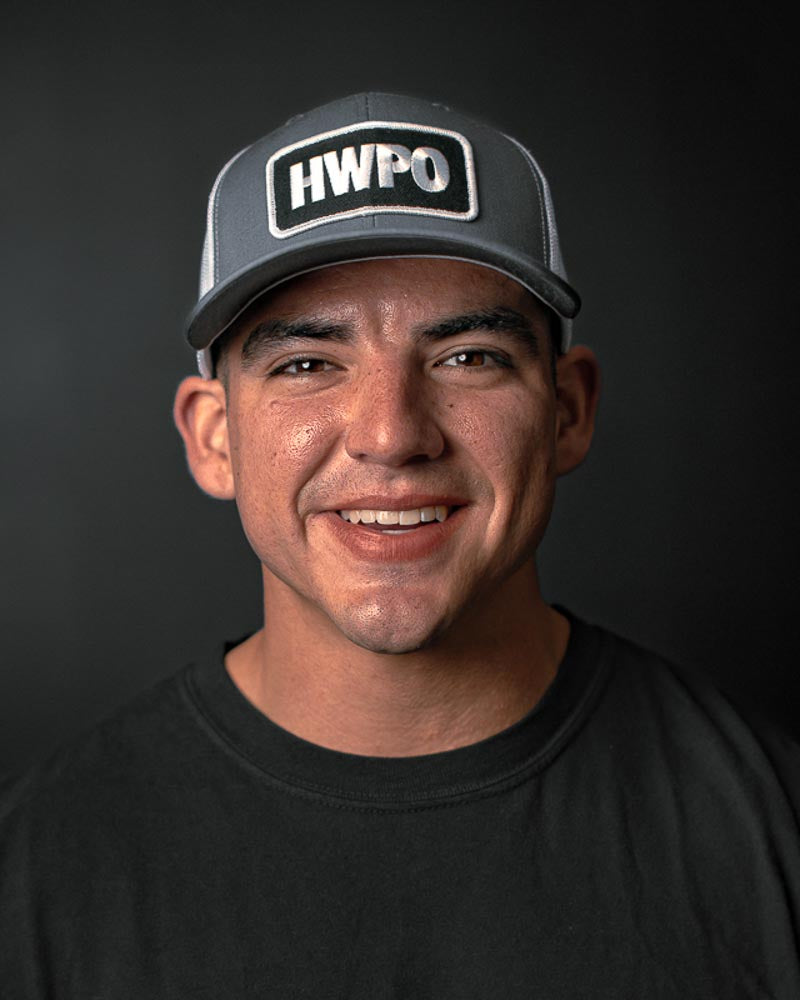 Josh Godinez wearing the HWPO Trucker Hat in Grey