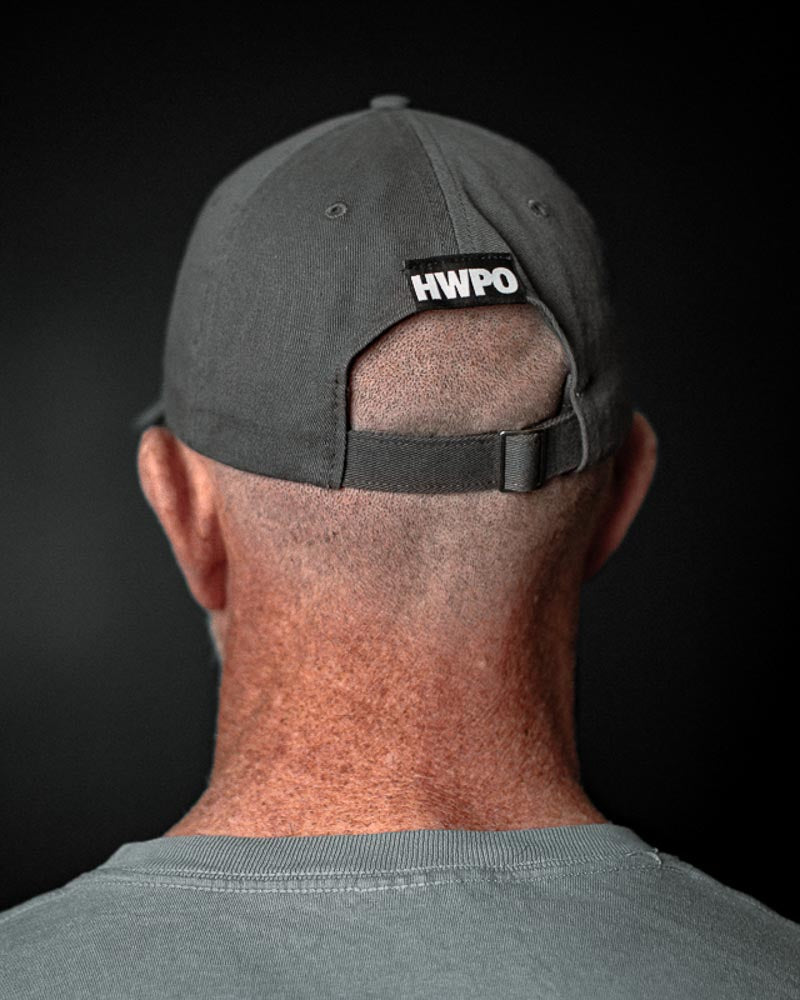 REar view of Matt O'Keefe wearing the Dark Grey HWPO Dad Hat