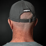 REar view of Matt O'Keefe wearing the Dark Grey HWPO Dad Hat